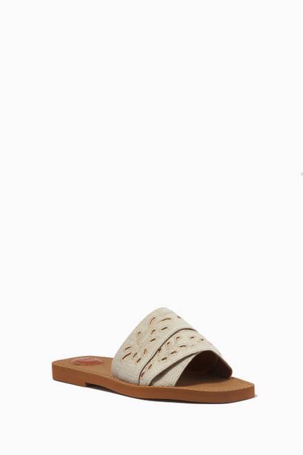 hover state of Woody Flat Mules in Embroidered Linen & Calfskin 