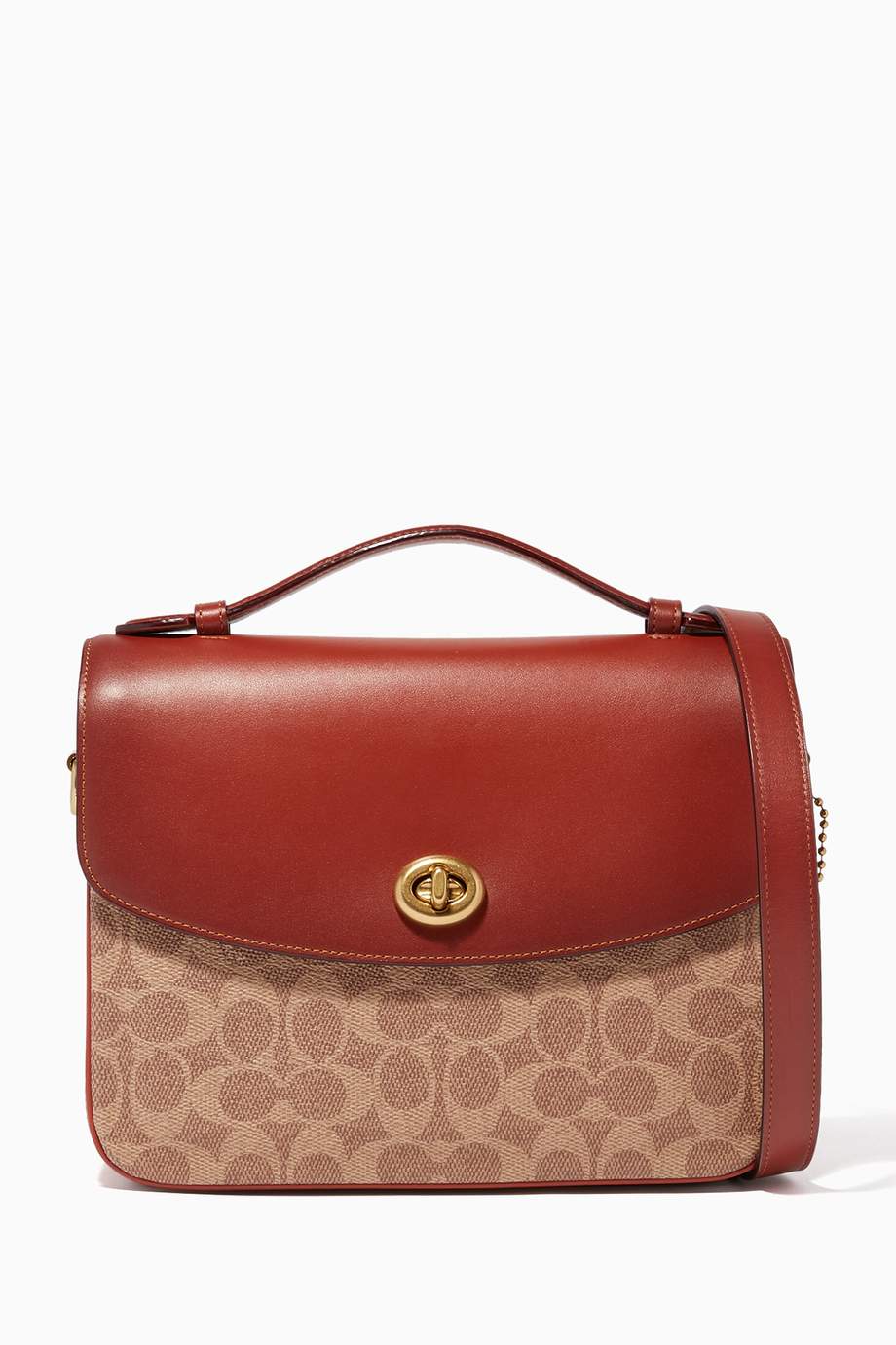 Shop Coach Brown Cassie Signature Canvas CrossBody Bag for Women