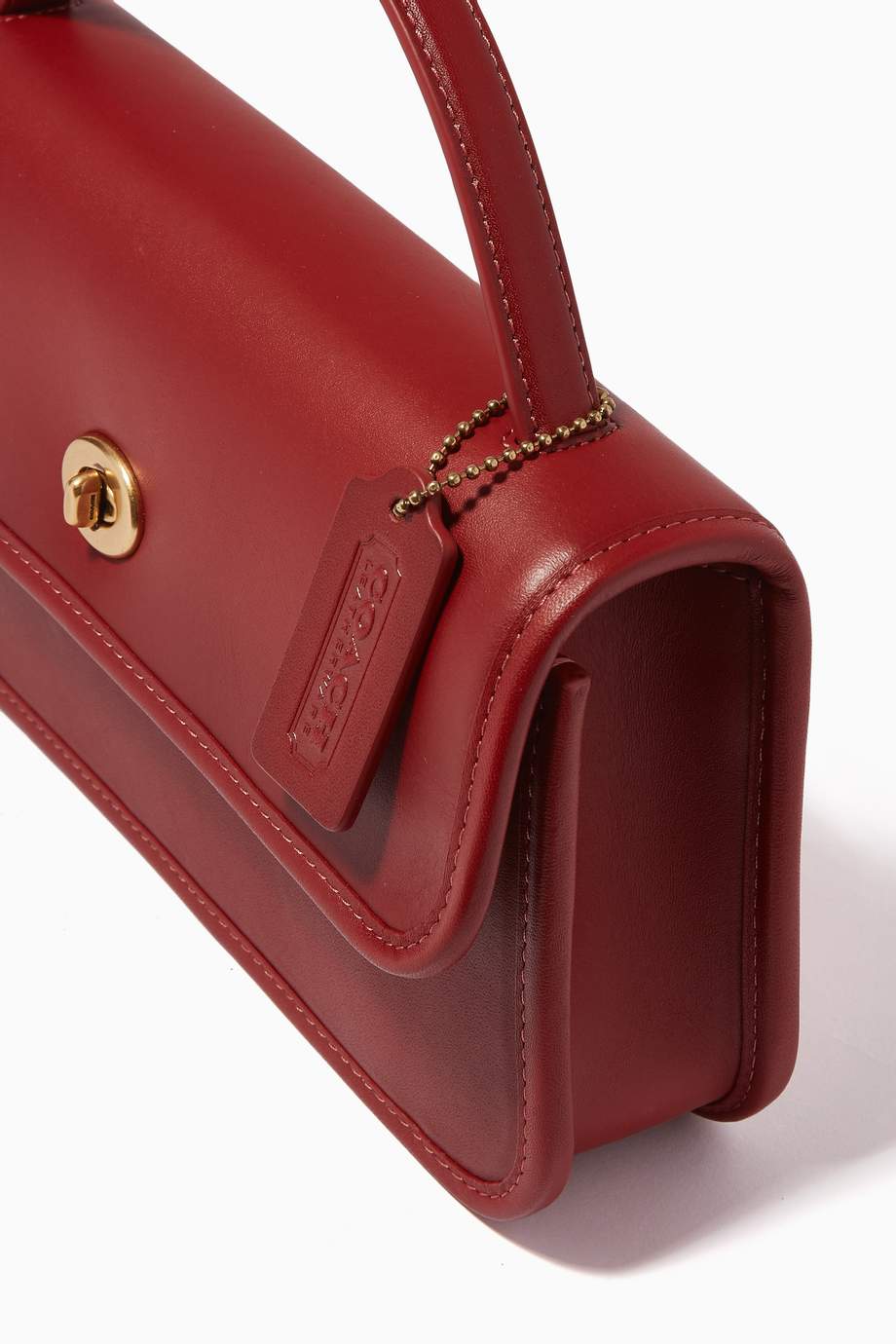 Shop Coach Red Turnlock Clutch Bag in Leather for Women Ounass UAE