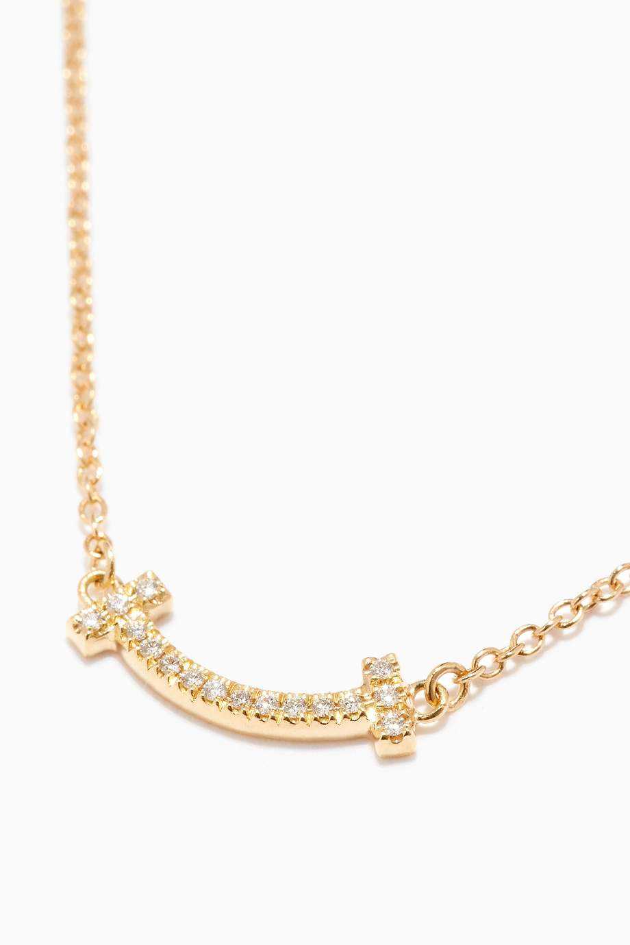 Shop Tiffany & Co. Gold Tiffany T Mini Diamond Smile Pendant in 18kt Gold for Women | Ounass UAE