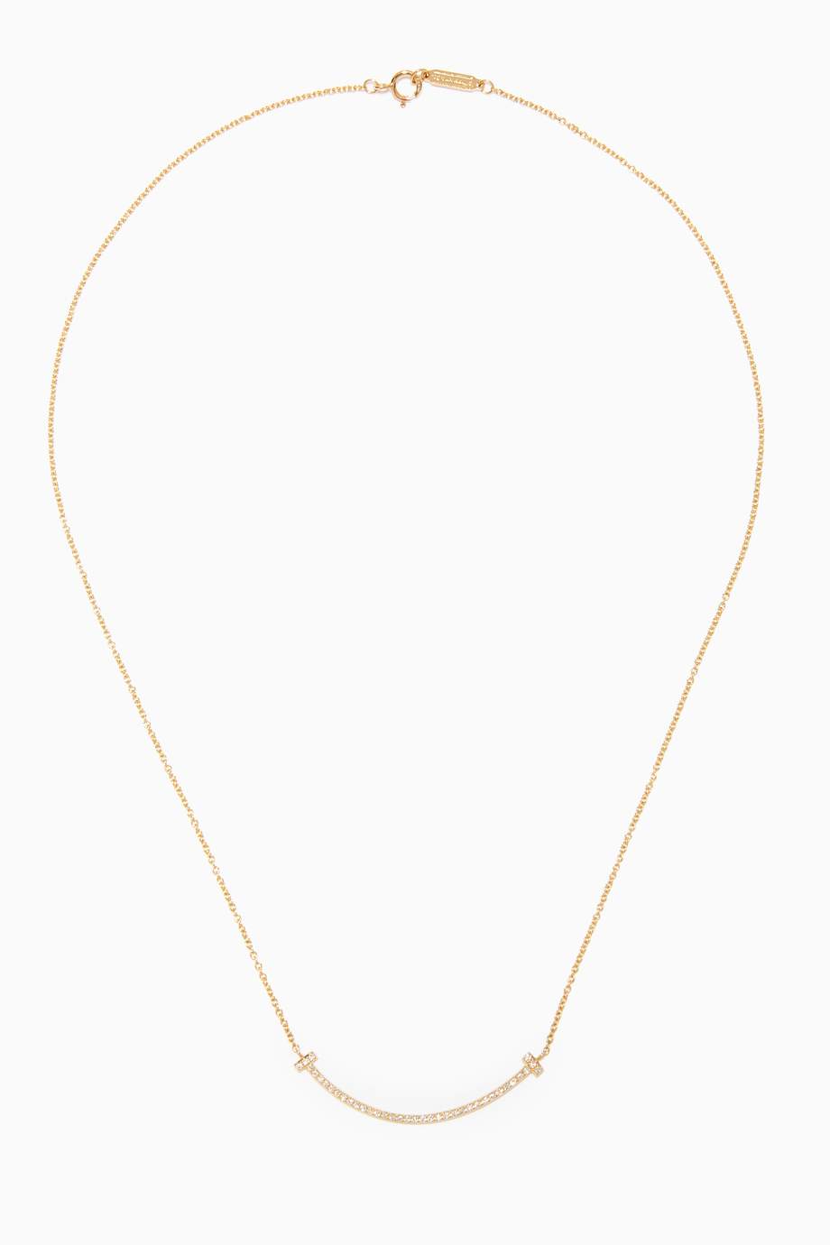 Shop Tiffany & Co. Gold Tiffany T Small Diamond Smile Pendant in 18kt ...