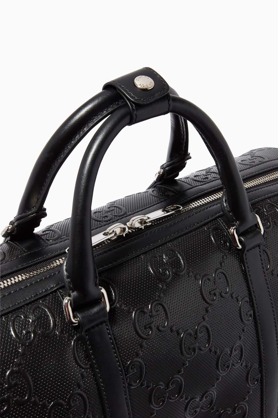 Shop Gucci Black GG Embossed Duffle Bag in Leather for Men Ounass UAE
