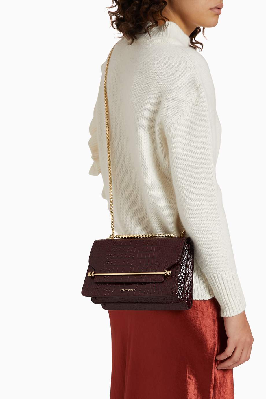 Shop strathberry burgundy mini east west bag in croco embossed leather