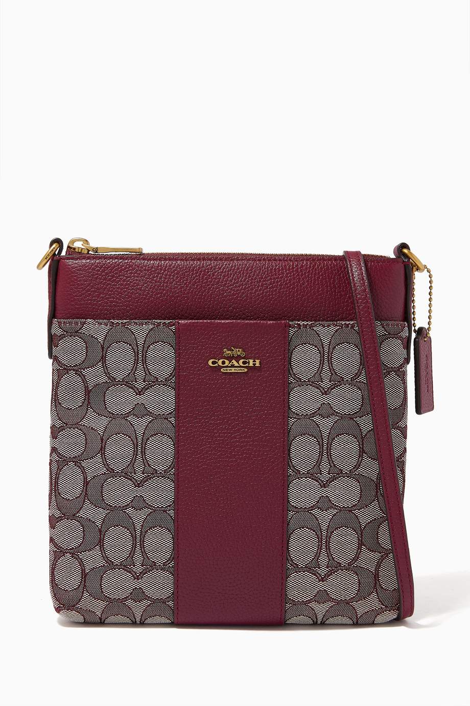 Shop Coach Burgundy Kitt Messenger Bag in Signature Jacquard and