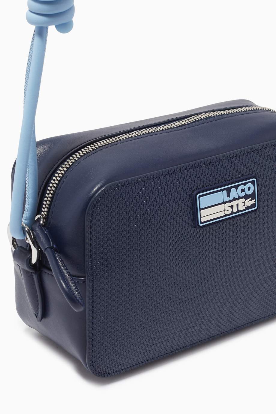 Shop Lacoste Blue Chantaco Badge Small Shoulder Bag in Matte Piqué ...
