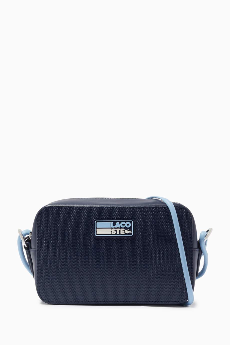 Shop Lacoste Blue Chantaco Badge Small Shoulder Bag in Matte Piqué ...