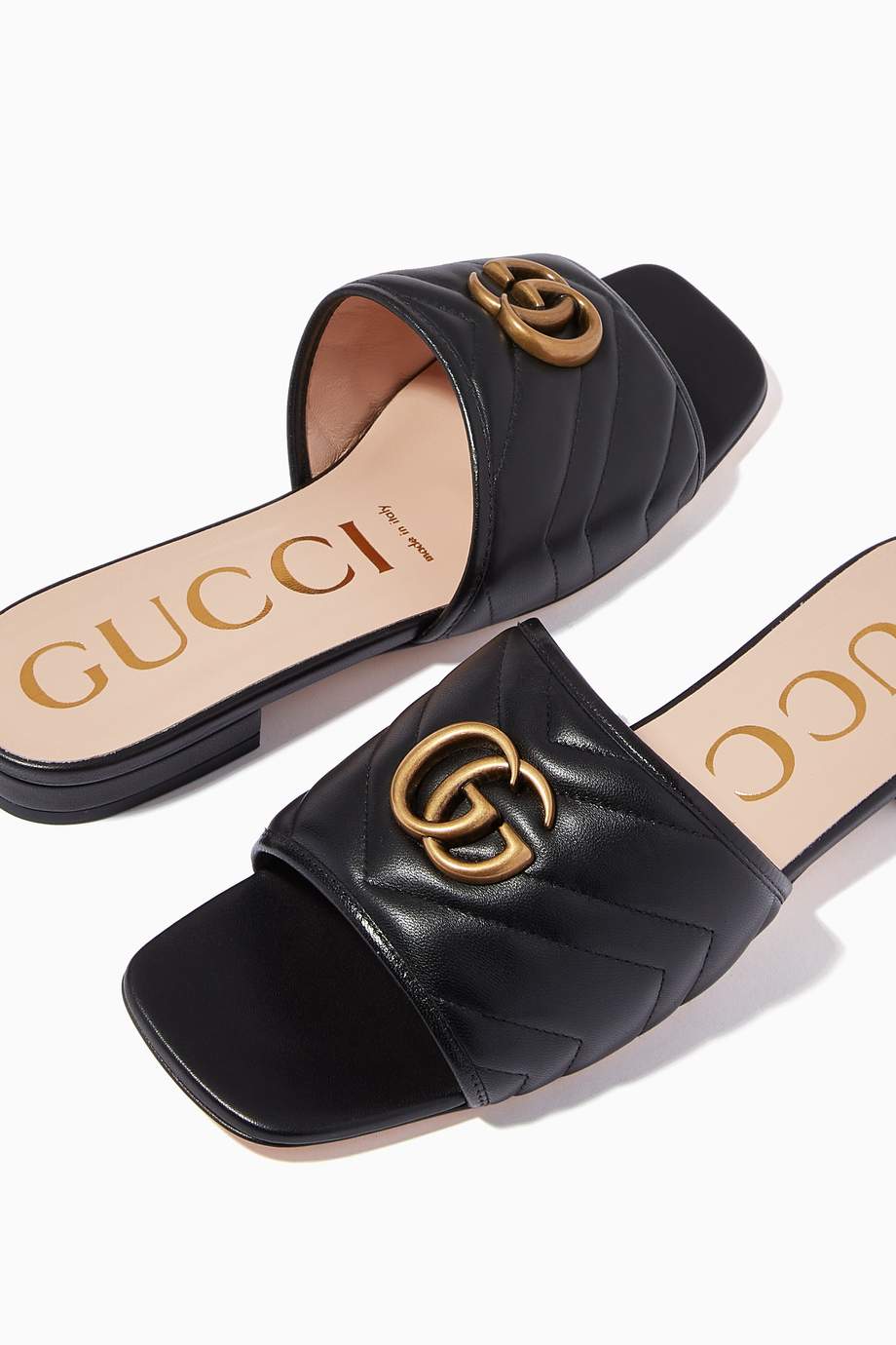 Shop Gucci Black Jolie GG Slides in Matelassé Leather for Women
