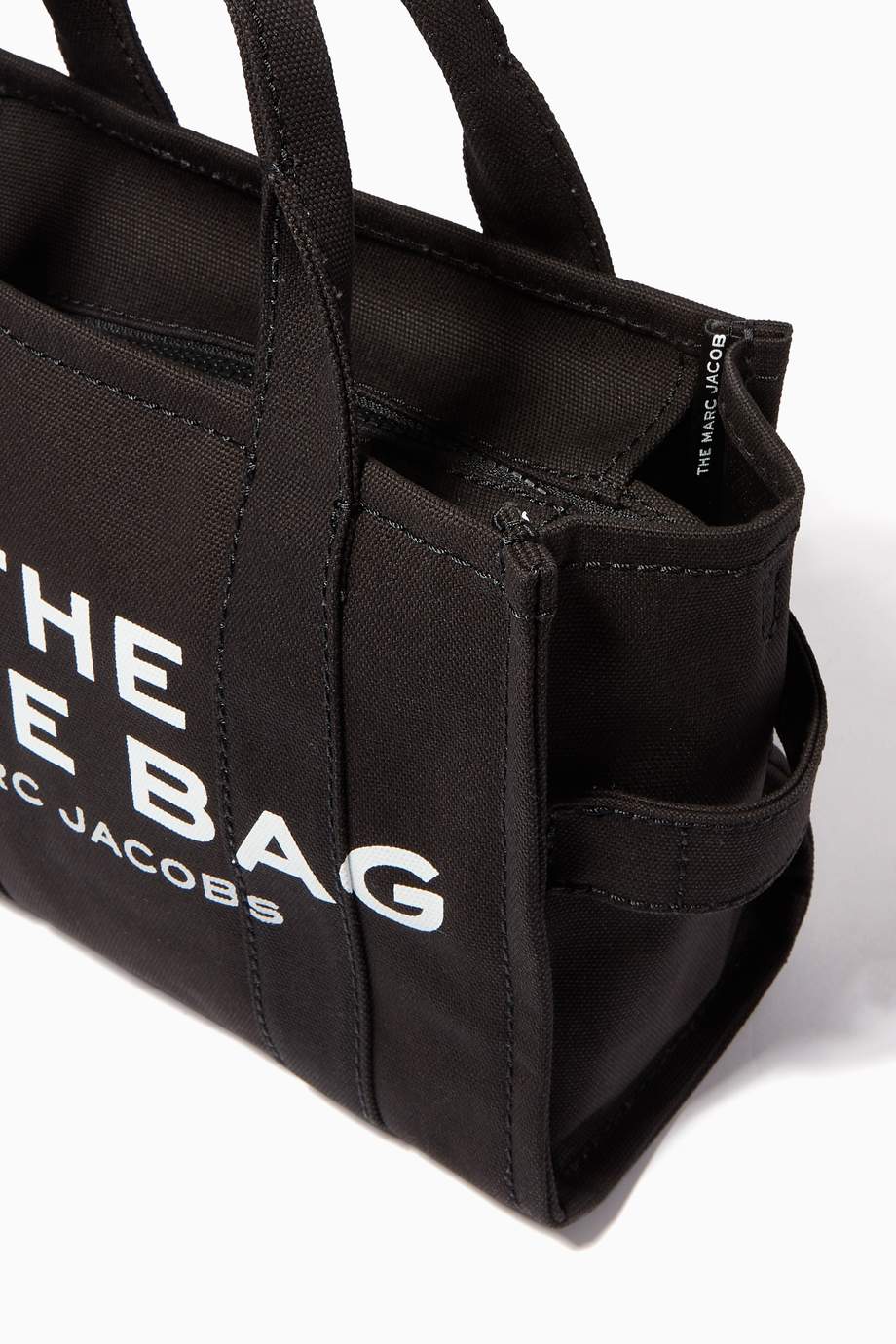 Shop The Marc Jacobs Black Mini Traveler Tote Bag in Canvas for Women