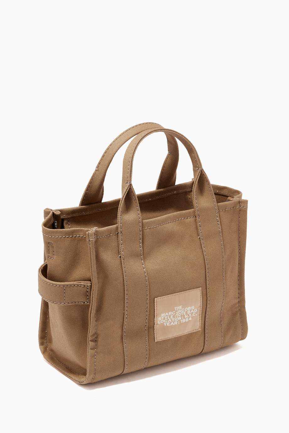 Shop The Marc Jacobs Green Mini Traveler Tote Bag in Canvas for Women ...
