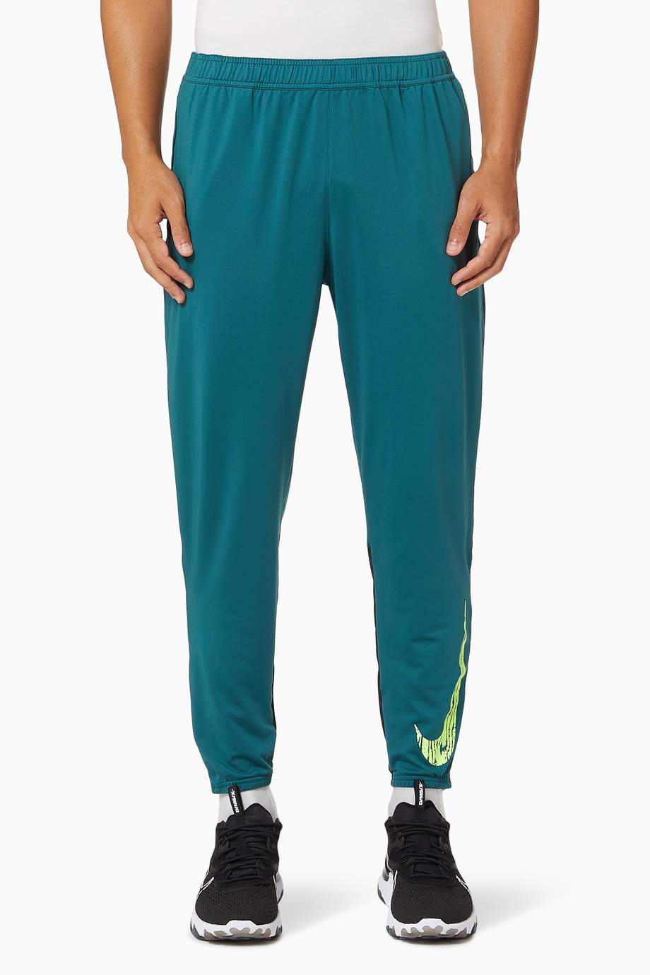 Shop Nike Green Nike Essential Wild Run Knit Pants for Men | Ounass UAE