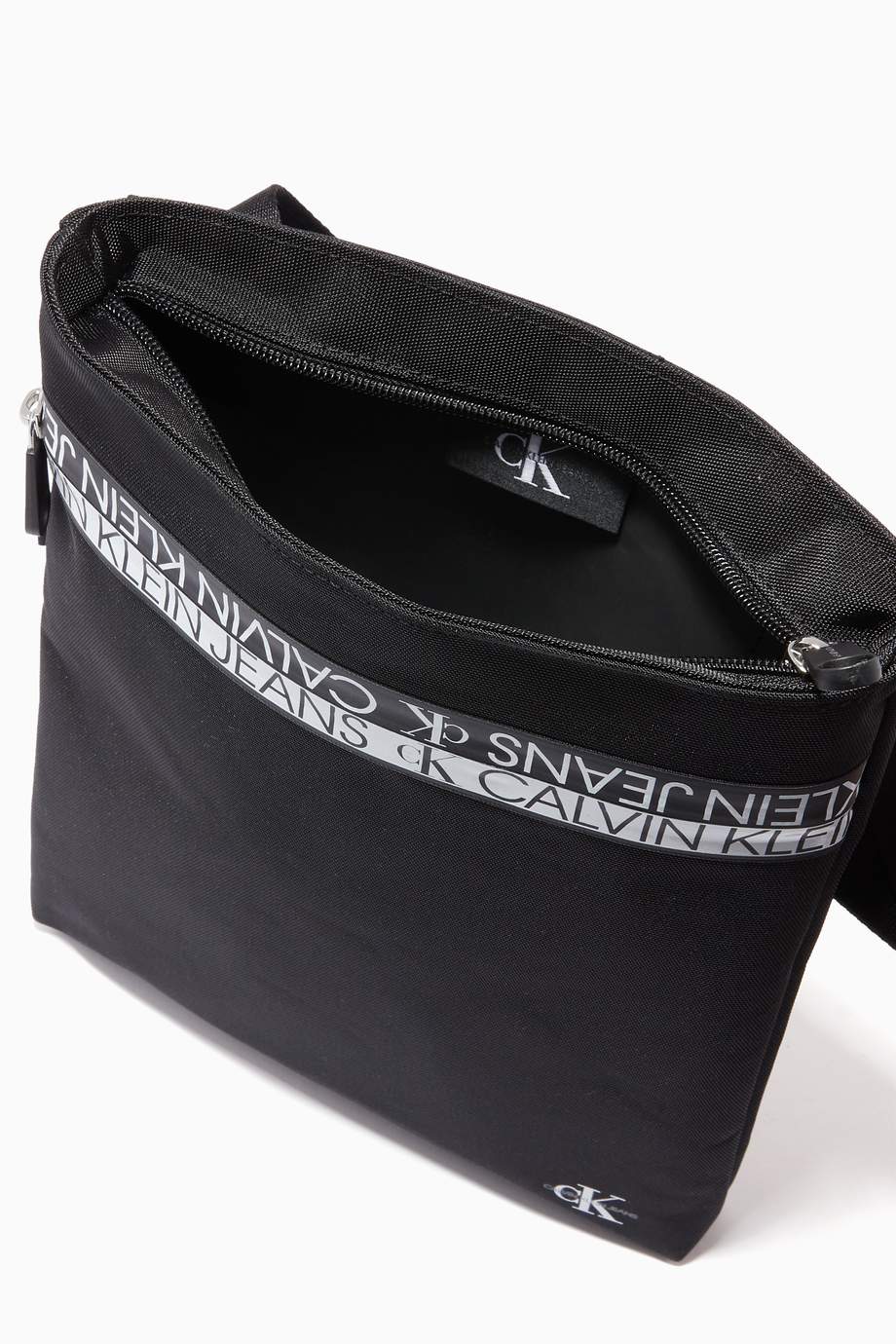 Shop Calvin Klein Jeans Black Flat Crossbody Bag in Recycled Polyester