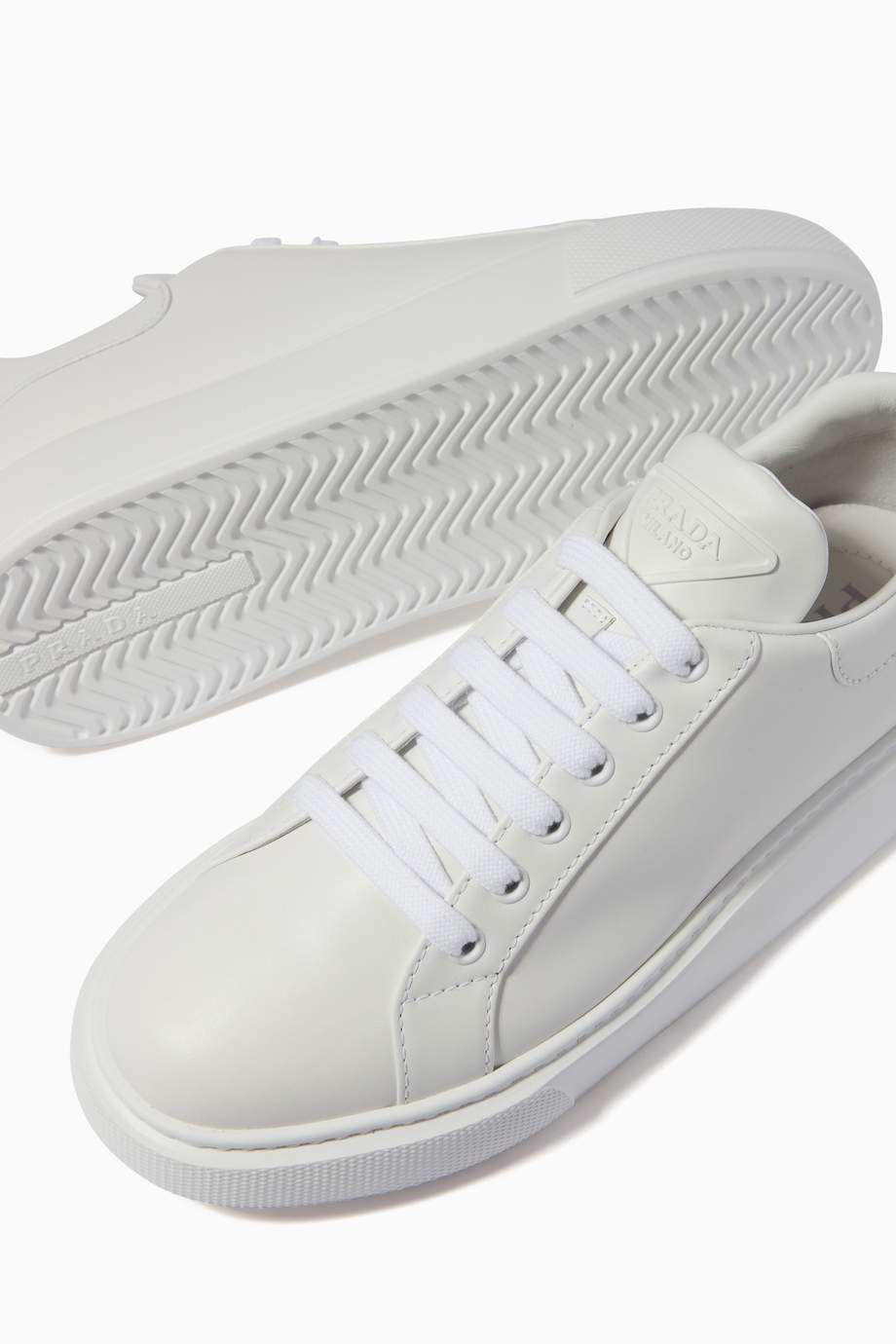 prada triangle logo sneakers