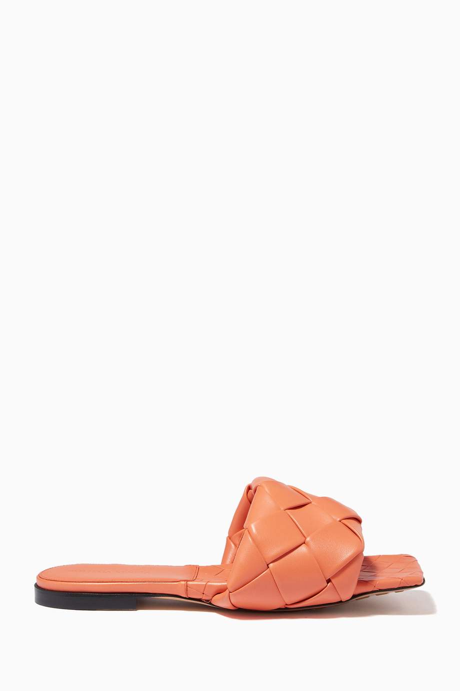Shop Bottega Veneta Orange Lido Flat Sandals in Intrecciato Nappa 