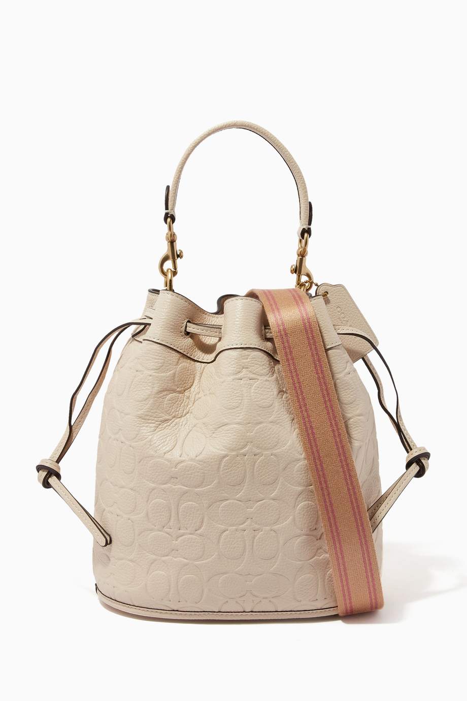 Shop Coach Neutral Field Bucket Bag in Signature Embossed Leather for Women | Ounass UAE