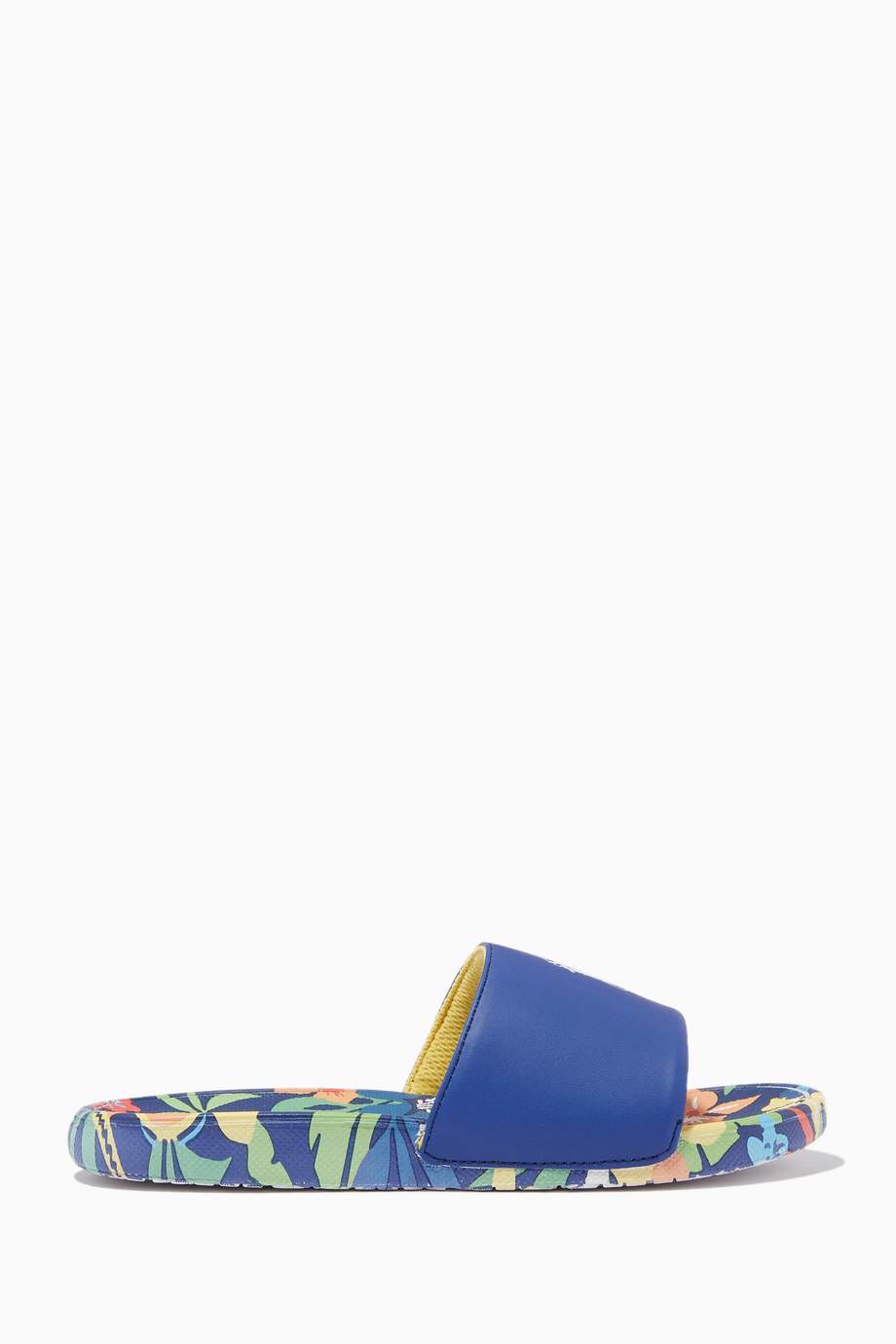 Shop Polo Ralph Lauren Blue Cayson Slide Sandals in Faux Leather ...