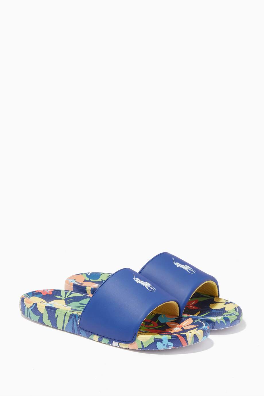 Shop Polo Ralph Lauren Blue Cayson Slide Sandals in Faux Leather ...